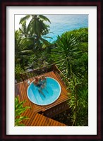 Couple enjoying hot tub at Fregate Resort, Seychelles Fine Art Print