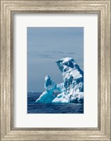 An arched iceberg floating in Gerlache Strait, Antarctica. Fine Art Print