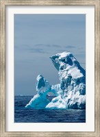An arched iceberg floating in Gerlache Strait, Antarctica. Fine Art Print