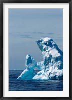 An arched iceberg floating in Gerlache Strait, Antarctica. Fine Art Print