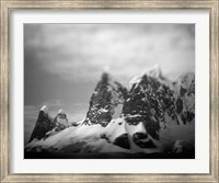 Antarctica, Mountain peaks along Cape Renaud in Lemaire Channel. Fine Art Print