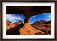 Boy under natural rock arch at Spitzkoppe, Namibia Fine Art Print