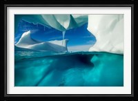 Antarctica, Arched Iceberg floating near Enterprise Island. Framed Print