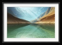 A beautiful river reflects light rays coming down from the sky Fine Art Print