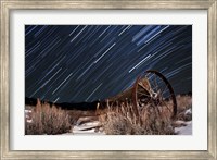 Abandoned farm equipment against a backdrop of star trails Fine Art Print