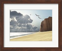 Sunlight shines down on two birds flying near a cliff by the ocean Fine Art Print