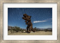 Tyrannosaurus rex sculpture against a backdrop of star trails, California Fine Art Print