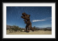 Tyrannosaurus rex sculpture against a backdrop of star trails, California Fine Art Print