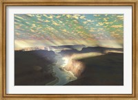 Sunrays shine down on mist over a canyon river in a desert wilderness Fine Art Print