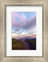A dry riverbed winds its way down through a wilderness area Fine Art Print