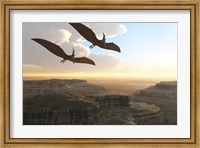 Two Pterodactyl flying dinosaurs soar above a beautiful canyon Fine Art Print