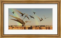 A flock of Pterodactyls fly out of a canyon Fine Art Print