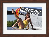 Cute pin-up girl sitting on the wing of a P-51 Mustang Fine Art Print