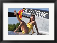 Cute pin-up girl sitting on the wing of a P-51 Mustang Fine Art Print