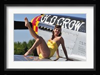 Cute pin-up girl sitting on the wing of a P-51 Mustang Fine Art Print