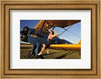 1940's style pin-up girl sitting on the wing of a Stearman biplane Fine Art Print