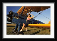 1940's style pin-up girl sitting on the wing of a Stearman biplane Fine Art Print