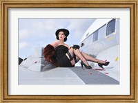 Glamorous woman in 1940's style attire sitting on a vintage aircraft Fine Art Print