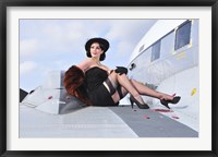 Glamorous woman in 1940's style attire sitting on a vintage aircraft Fine Art Print