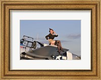 Pin-up girl sitting on the wing of a P-51 Mustang Fine Art Print