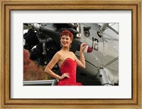 Redhead pin-up girl in 1940's style dancer attire holding on to a vintage aircraft propeller Fine Art Print