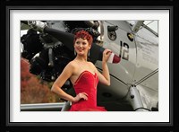 Redhead pin-up girl in 1940's style dancer attire holding on to a vintage aircraft propeller Fine Art Print