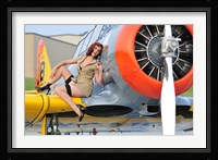1940's style pin-up girl posing on a T-6 aircraft Fine Art Print