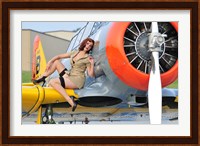 1940's style pin-up girl posing on a T-6 aircraft Fine Art Print
