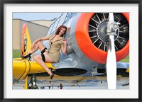 1940's style pin-up girl posing on a T-6 aircraft Fine Art Print