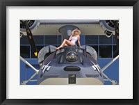 Retro pin-up girl posing with a World War II era PBY Catalina seaplane Fine Art Print