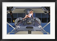Retro pin-up girl posing with a World War II era PBY Catalina seaplane Fine Art Print