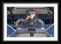 Retro pin-up girl posing with a World War II era PBY Catalina seaplane Fine Art Print