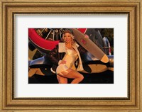 1940's pin-up girl posing with a vintage T-6 Texan aircraft Fine Art Print