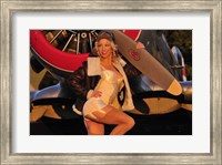 1940's pin-up girl posing with a vintage T-6 Texan aircraft Fine Art Print