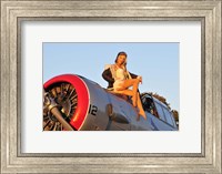 1940's style aviator pin-up girl posing with a vintage T-6 Texan aircraft Fine Art Print