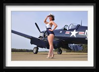 1940's Navy pin-up girl posing with a vintage Corsair aircraft Framed Print