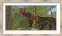 Two Saber-Toothed Cats search for prey in a pine forest Fine Art Print