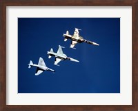 Two F-5 Tiger II's and an A-4E Skyhawk in flight above the Pacific Ocean Fine Art Print