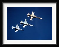 Two F-5 Tiger II's and an A-4E Skyhawk in flight above the Pacific Ocean Fine Art Print