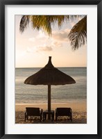 Mauritius, Beach scene, umbrella, chairs, palm fronds Fine Art Print