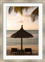 Mauritius, Beach scene, umbrella, chairs, palm fronds Fine Art Print