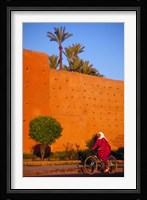 Veiled Woman Bicycling Below Red City Walls, Marrakech, Morocco Fine Art Print