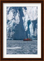 Zodiac with iceberg in the ocean, Antarctica Fine Art Print