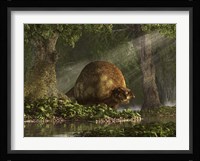 A large Glyptodon stands near the edge of a stream Fine Art Print