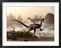 A pair of velociraptors patrol the shore of an ancient lake Fine Art Print