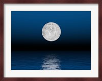 Beautiful full moon against a deep blue sky over the ocean Fine Art Print