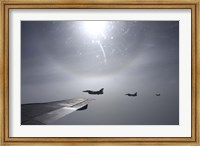 F-16 Fighting Falcon fighters over the wing of a KC-135 Stratotanker Fine Art Print