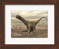 Large Argentinosaurus dinosaur walking on rocky terrain Fine Art Print