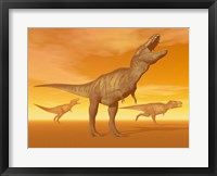 Tyrannosaurus Rex dinosaurs in an orange foggy desert by sunset Fine Art Print