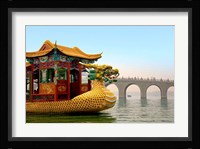 The Summer Palace, a traditional Dragon Boat passes the Seventeen Arch Bridge, Kunming lake, Beijing, China Fine Art Print